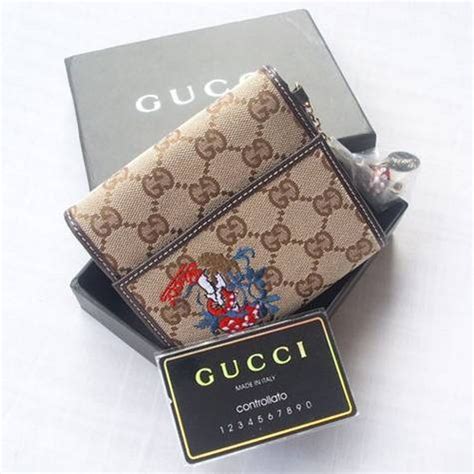 faux porte monnaie gucci